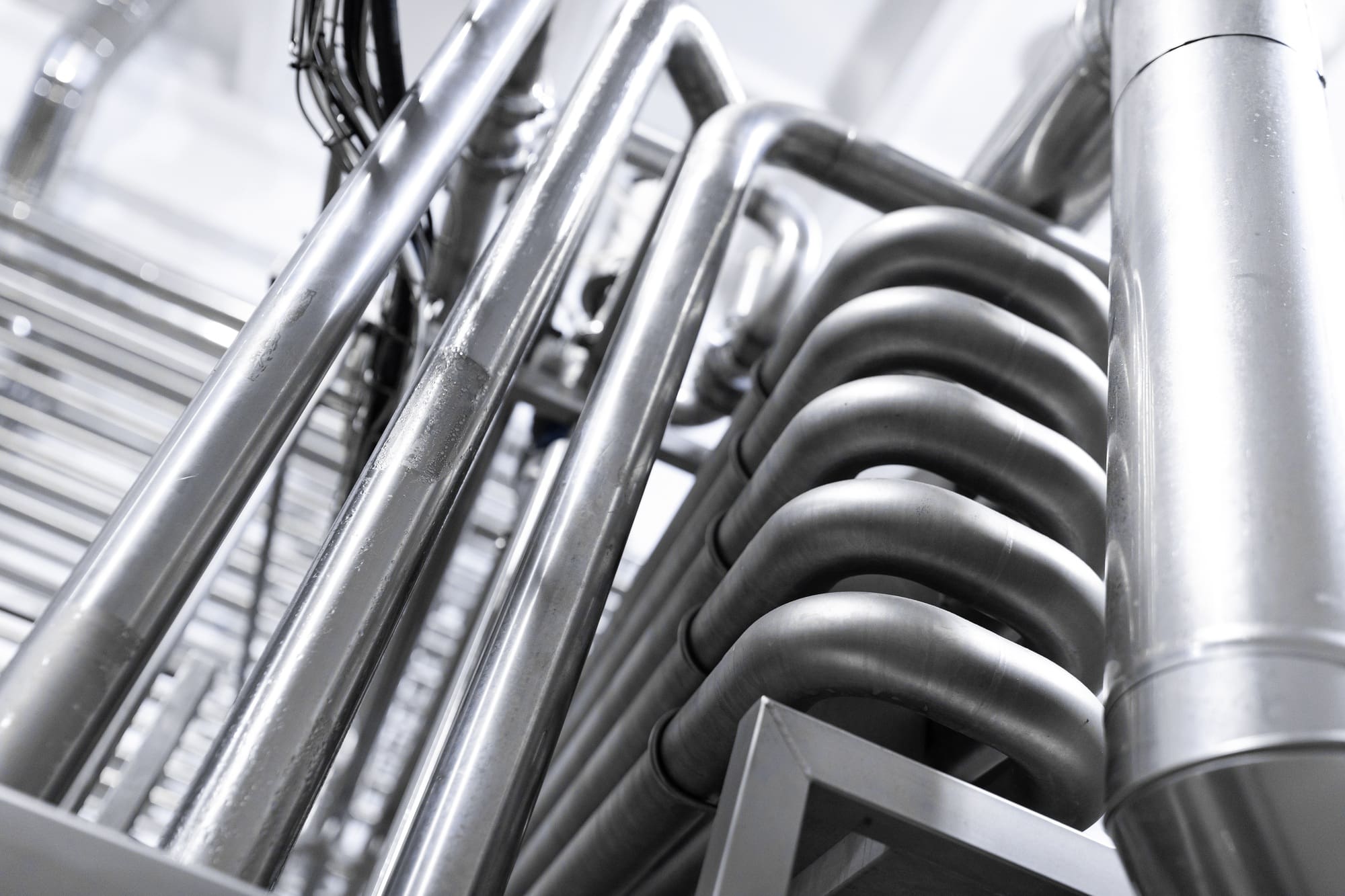 Chrome pipes close-up. Industrial background